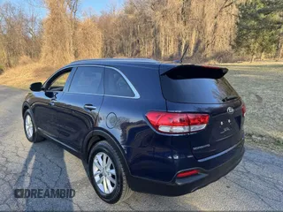 2016 Kia Sorento LX with VIN 5XYPGDA5XGG142632, listed as a IAAI auction lot 42143508 with 146,966 mi miles. Bid and sale history available at carsss.com. Image 3.