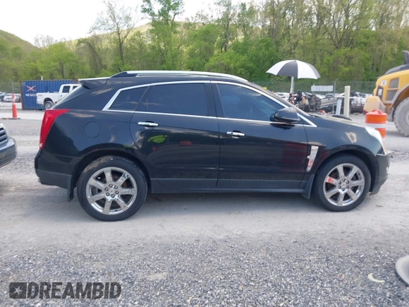 2012 Cadillac SRX Performance Collection with VIN 3GYFNEE32CS512118, listed as a IAAI auction lot 42158452 with 143,449 mi miles. Bid and sale history available at carsss.com. Image 13.