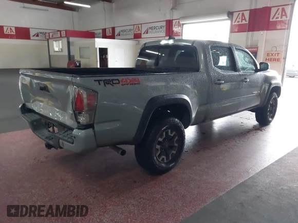 2021 Toyota Tacoma SR5 z VIN 3TMDZ5BN5MM114494, wystawiony jako IAAI lot #41723032 z przebiegiem 54 477 mil mil oraz . Historia ofert i sprzedaży dostępna na DreamBid. Obrazek 4.