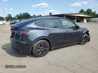 2024 Tesla Model Y Long Range z VIN 7SAYGDEE9RF186388, wystawiony jako Copart lot #58471595 z przebiegiem 23 185 mil mil oraz Szkoda całkowita • Salvage title. Historia ofert i sprzedaży dostępna na DreamBid. Obrazek 3.