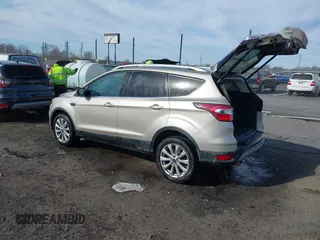 2017 Ford Escape Titanium with VIN 1FMCU0JD3HUB19602, listed as a IAAI auction lot 41816296 with 70,311 mi miles. Bid and sale history available at carsss.com. Image 3.