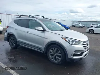 2018 Hyundai Santa Fe Ultimate with VIN 5XYZWDLA7JG542869, listed as a IAAI auction lot 41889520 with 51,294 mi miles and . Bid and sale history available at DreamBid. Image 1.