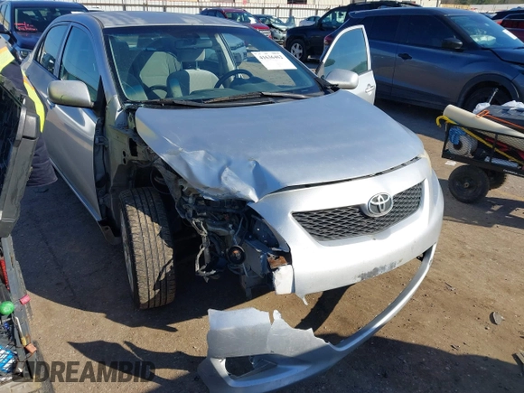 2009 Toyota Corolla with VIN JTDBL40E999021621, listed as a IAAI auction lot 41636462 with 123,650 mi miles. Bid and sale history available at carsss.com. Image 6.
