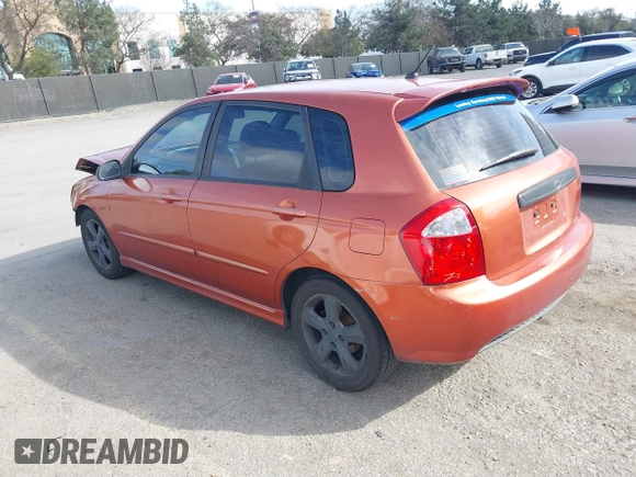 2007 Kia Spectra with VIN KNAFE161275003137, listed as a IAAI auction lot 41697530 with 256,834 mi miles. Bid and sale history available at carsss.com. Image 3.