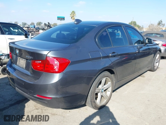 2015 BMW 3 Series 320i with VIN WBA3B1C55FK140317, listed as a IAAI auction lot 41434306 with 120,627 mi miles. Bid and sale history available at carsss.com. Image 4.