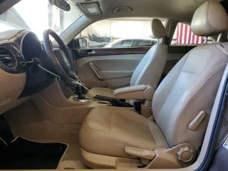 2014 Volkswagen Beetle 2.5L w/Sun with VIN 3VWJP7AT0EM632824, listed as a Copart auction lot 87279494 with Not Provided miles and Salvage Title. Bid and sale history available at DreamBid. Image 7.
