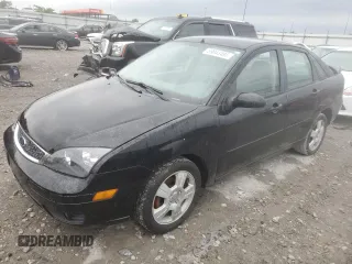 2005 Ford Focus S with VIN 1FAFP34N45W285454, listed as a Copart auction lot 59043485 with 165,071 mi miles and Salvage title. Bid and sale history available at DreamBid. Image 1.