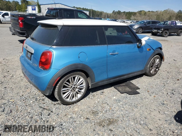 2015 MINI Hardtop with VIN WMWXM5C5XFT942679, listed as a Copart auction lot 49799655 with 79,072 mi miles and Salvage Title. Bid and sale history available at DreamBid. Image 3.