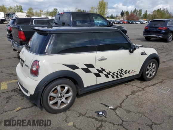 2009 MINI Hardtop S with VIN WMWMF73569TW84934, listed as a Copart auction lot 51344975 with 123,929 mi miles and Salvage title. Bid and sale history available at DreamBid. Image 3.
