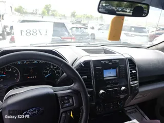 2018 Ford F-150 XL with VIN 1FTEW1E57JKF37999, listed as a IAAI auction lot 42240766 with 159,287 mi miles and . Bid and sale history available at carsss.com. Image 1.