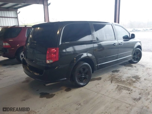 2013 Dodge Grand Caravan SXT with VIN 2C4RDGCG1DR527778, listed as a IAAI auction lot 41947721 with 115,886 mi miles. Bid and sale history available at carsss.com. Image 4.