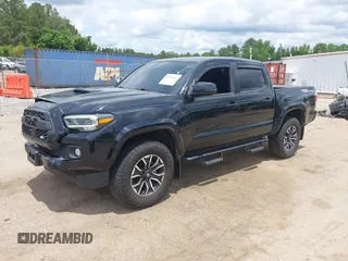 2020 Toyota Tacoma SR5 z VIN 3TMAZ5CN8LM138501, wystawiony jako IAAI lot #42321412 z przebiegiem 81 806 mil mil oraz . Historia ofert i sprzedaży dostępna na DreamBid. Obrazek 20.