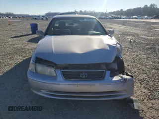 2000 Toyota Camry CE z VIN 4T1BG22K7YU738912, wystawiony jako Copart lot #88852845 z przebiegiem 122 569 mil mil oraz Szkoda całkowita • Salvage title. Historia ofert i sprzedaży dostępna na DreamBid. Obrazek 5.
