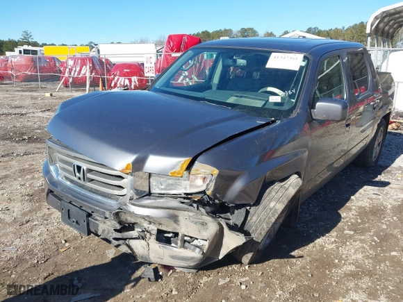 2014 Honda Ridgeline RTL with VIN 5FPYK1F52EB002984, listed as a IAAI auction lot 41347361 with 162,015 mi miles. Bid and sale history available at carsss.com. Image 6.
