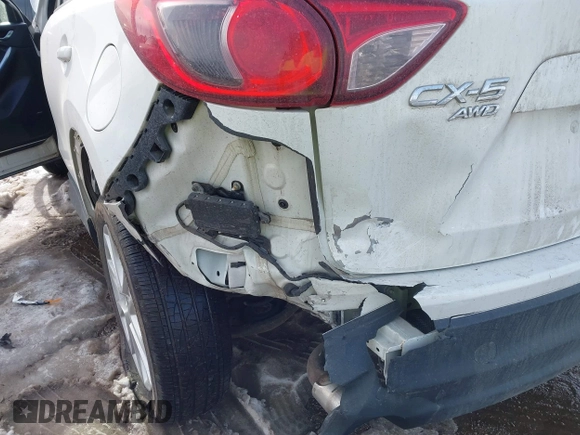 2014 Mazda CX-5 Grand Touring with VIN JM3KE4DY9E0300491, listed as a IAAI auction lot 41657153 with 157,394 mi miles and . Bid and sale history available at DreamBid. Image 6.