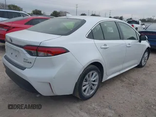 2024 Toyota Corolla Hybrid LE with VIN JTDBCMFE4R3045299, listed as a IAAI auction lot 41283042 with 13,649 mi miles. Bid and sale history available at carsss.com. Image 4.