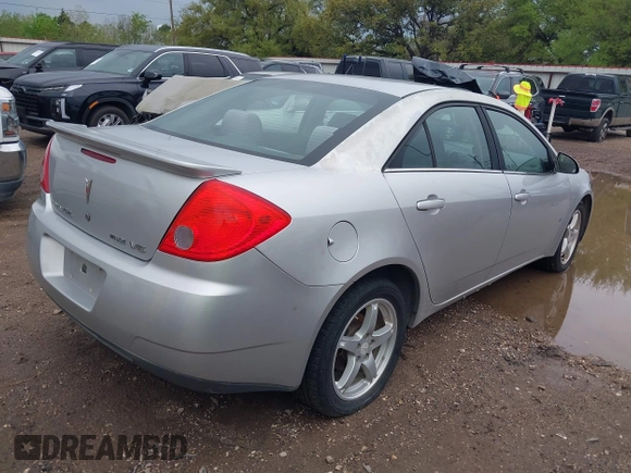 2009 Pontiac G6 1SB with VIN 1G2ZJ57K094243360, listed as a IAAI auction lot 41904278 with 144,346 mi miles and . Bid and sale history available at DreamBid. Image 4.