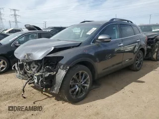 2015 Mazda CX-9 Grand Touring z VIN JM3TB3DA6F0460842, wystawiony jako Copart lot #52630325 z przebiegiem 21 666 mil mil oraz Szkoda całkowita • Salvage title. Historia ofert i sprzedaży dostępna na DreamBid. Obrazek 1.