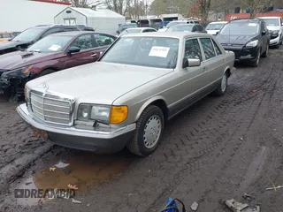 1987 Mercedes-Benz 560 with VIN WDBCA39D5HA357048, listed as a IAAI auction lot 41672343 with 151,635 mi miles and . Bid and sale history available at DreamBid. Image 2.