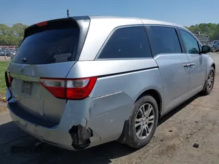 2011 Honda Odyssey EX-L with VIN 5FNRL5H62BB075789, listed as a IAAI auction lot 42035746 with 238,616 mi miles and . Bid and sale history available at carsss.com. Image 4.