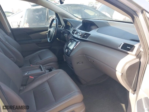 2016 Honda Odyssey Touring Elite with VIN 5FNRL5H90GB139183, listed as a IAAI auction lot 41534324 with 93,807 mi miles. Bid and sale history available at carsss.com. Image 5.