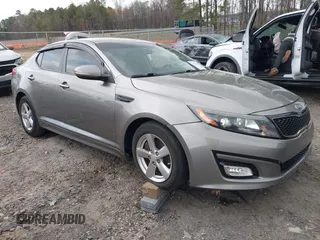 2015 Kia Optima LX z VIN 5XXGM4A75FG500233, wystawiony jako IAAI lot #41850244 z przebiegiem 124 980 mil mil oraz . Historia ofert i sprzedaży dostępna na DreamBid. Obrazek 1.