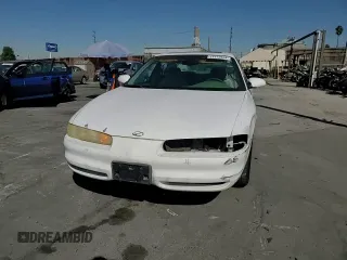 1998 Oldsmobile Intrigue GL z VIN 1G3WS52K2WF325982, wystawiony jako Copart lot #77172634 z przebiegiem 141 276 mil mil oraz Szkody całkowita. Historia ofert i sprzedaży dostępna na DreamBid. Obrazek 11.