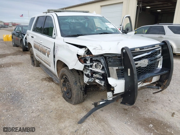 2020 Chevrolet Tahoe Commercial with VIN 1GNLCDEC7LR199179, listed as a IAAI auction lot 41502623 with 87,271 mi miles. Bid and sale history available at carsss.com. Image 6.