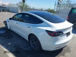 2023 Tesla Model 3 z VIN 5YJ3E1EA2PF514871, wystawiony jako IAAI lot #41703073 z przebiegiem 21 227 mil mil oraz . Historia ofert i sprzedaży dostępna na DreamBid. Obrazek 3.
