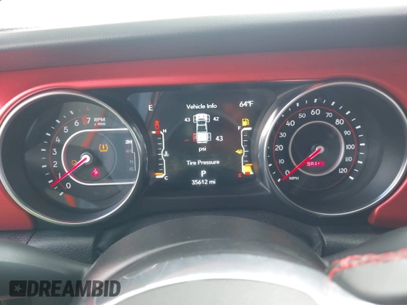 2021 Jeep Gladiator Rubicon with VIN 1C6JJTBGXML572976, listed as a IAAI auction lot 42134909 with 35,612 mi miles and . Bid and sale history available at DreamBid. Image 7.