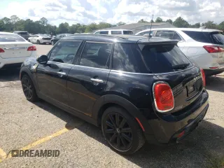 2016 MINI Hardtop 4 Door S with VIN WMWXU3C58G2B67264, listed as a Copart auction lot 61454215 with 66,550 mi miles and Salvage title. Bid and sale history available at DreamBid. Image 2.