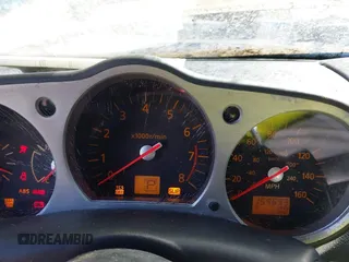 2005 Nissan 350Z Touring with VIN JN1AZ34D35M610759, listed as a IAAI auction lot 41757344 with 159,693 mi miles. Bid and sale history available at carsss.com. Image 7.