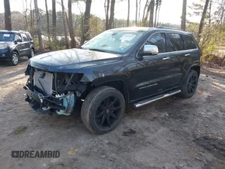 2015 Jeep Grand Cherokee Overland with VIN 1C4RJECGXFC957530, listed as a IAAI auction lot 41633522 with 168,258 mi miles and . Bid and sale history available at DreamBid. Image 17.
