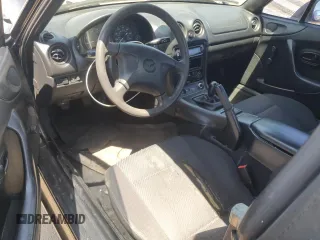 1999 Mazda MX-5 Miata with VIN JM1NB3535X0119662, listed as a Copart auction lot 61870445 with 84,787 mi miles and Clean title. Bid and sale history available at DreamBid. Image 8.