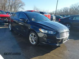 2015 Ford Fusion Energi Titanium with VIN 3FA6P0SU9FR293594, listed as a IAAI auction lot 41803652 with 194,703 mi miles. Bid and sale history available at carsss.com. Image 1.
