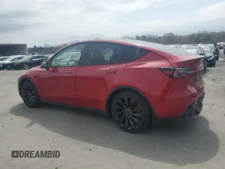 2023 Tesla Model Y Performance with VIN 7SAYGDEF4PF960357, listed as a Copart auction lot 51126105 with 37,252 mi miles and Salvage Title. Bid and sale history available at DreamBid. Image 2.