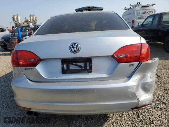 2014 Volkswagen Jetta SE с VIN 3VWD17AJ9EM437088, выставлен на аукционе Copart как лот 64810275 с пробегом 92 165 миль миль и Списание • Salvage title. История ставок и продаж доступна на DreamBid. Изображение 6.