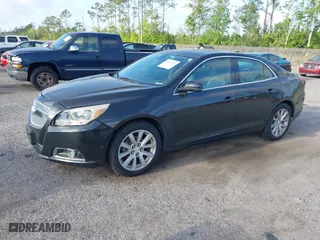 2013 Chevrolet Malibu LT with VIN 1G11E5SA6DF265901, listed as a IAAI auction lot 41971492 with 203,612 mi miles. Bid and sale history available at carsss.com. Image 2.