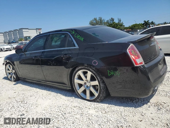 2012 Chrysler 300 SRT8 with VIN 2C3CCAFJXCH800724, listed as a Copart auction lot 49680465 with 87,279 mi miles and Salvage Title. Bid and sale history available at carsss.com. Image 2.