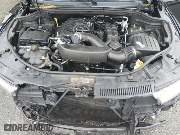 2023 Dodge Durango SXT with VIN 1C4RDHAG5PC634936, listed as a Copart auction lot 57282195 with 56,689 mi miles and Salvage title. Bid and sale history available at DreamBid. Image 12.