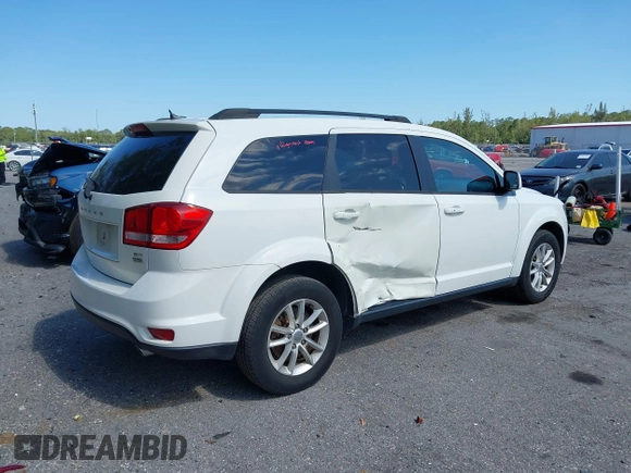 2015 Dodge Journey SXT with VIN 3C4PDCBG4FT727376, listed as a IAAI auction lot 42029881 with 151,042 mi miles. Bid and sale history available at carsss.com. Image 6.