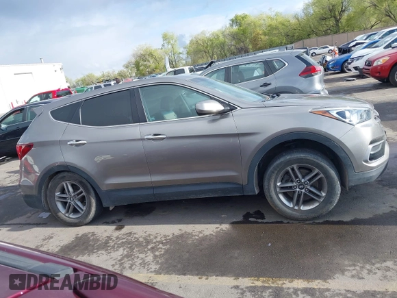 2017 Hyundai Santa Fe 2.4L with VIN 5XYZTDLB9HG440064, listed as a IAAI auction lot 42061524 with 140,365 mi miles and . Bid and sale history available at DreamBid. Image 14.