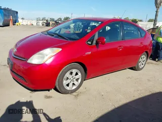 2007 Toyota Prius with VIN JTDKB20U777675640, listed as a IAAI auction lot 42021455 with 153,556 mi miles and . Bid and sale history available at carsss.com. Image 2.