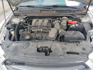 2013 Ford Taurus SEL with VIN 1FAHP2E81DG129229, listed as a IAAI auction lot 41898917 with 205,865 mi miles. Bid and sale history available at carsss.com. Image 10.