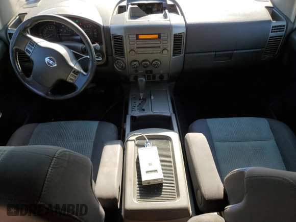 2006 Nissan Titan SE with VIN 1N6BA06B96N521452, listed as a Copart auction lot 70101084 with 197,101 mi miles and Salvage Title. Bid and sale history available at DreamBid. Image 8.