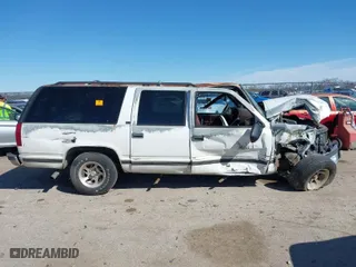 1996 GMC Suburban with VIN 1GDEC16R8TJ738647, listed as a IAAI auction lot 41688543 with 216,078 mi miles. Bid and sale history available at carsss.com. Image 14.