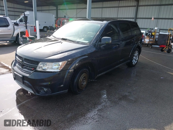 2013 Dodge Journey R/T with VIN 3C4PDCEG7DT682670, listed as a IAAI auction lot 42057985 with 221,755 mi miles and . Bid and sale history available at DreamBid. Image 2.