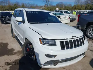 2016 Jeep Grand Cherokee Overland with VIN 1C4RJFCT7GC404435, listed as a IAAI auction lot 41518239 with 179,960 mi miles and . Bid and sale history available at DreamBid. Image 1.