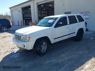2007 Jeep Grand Cherokee Laredo with VIN 1J8HS48PX7C657685, listed as a IAAI auction lot 41748528 with 247,534 mi miles. Bid and sale history available at carsss.com. Image 2.