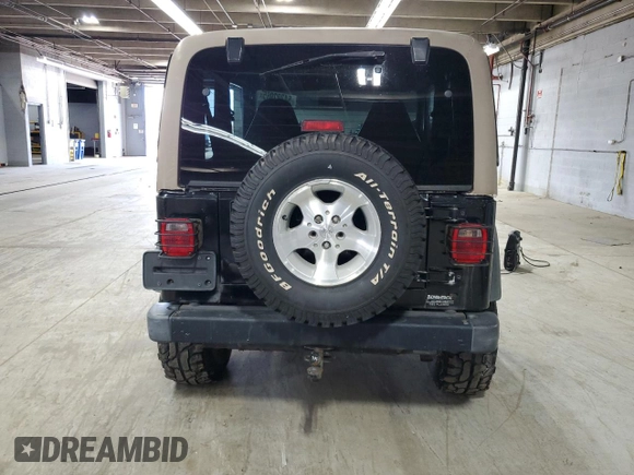 2001 Jeep Wrangler Sport with VIN 1J4FA49S31P331578, listed as a Copart auction lot 54302965 with 102,550 mi miles and Clean Title. Bid and sale history available at carsss.com. Image 6.